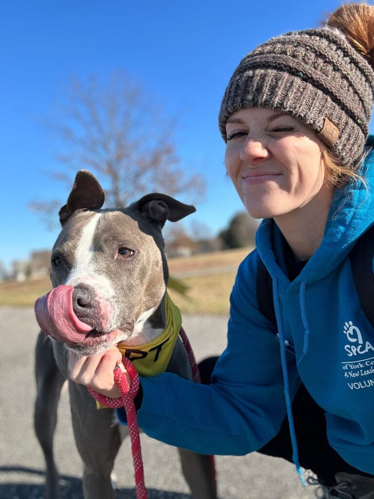 a woman with a dog