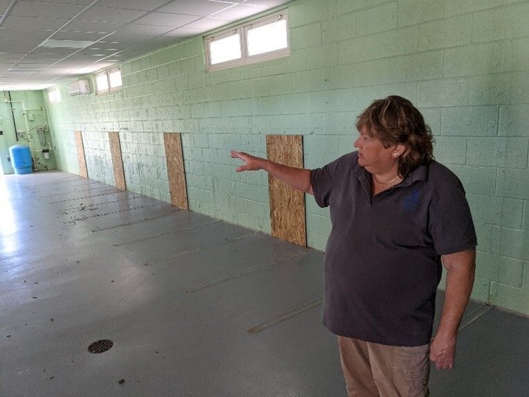 a woman standing in a room